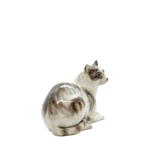 796 - A MEISSEN CAT19th CENTURYthe seated cat decorated with shades of brown,10cms high