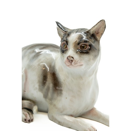 796 - A MEISSEN CAT19th CENTURYthe seated cat decorated with shades of brown,10cms high