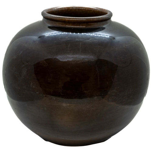 1979 - A RARE CHINESE BROWN-GLAZED OVOID JARQING DYNASTY, 18TH CENTURYcovered all over in a rich treacle-br... 