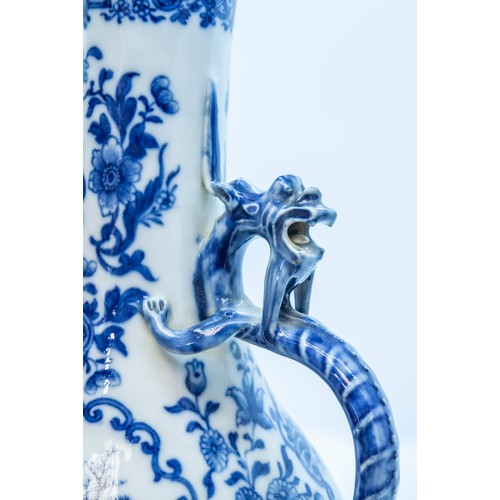 1980 - A FINE CHINESE BLUE AND WHITE EWERQING DYNASTY, 19TH CENTURYdecorated with a panel depicting birds i... 