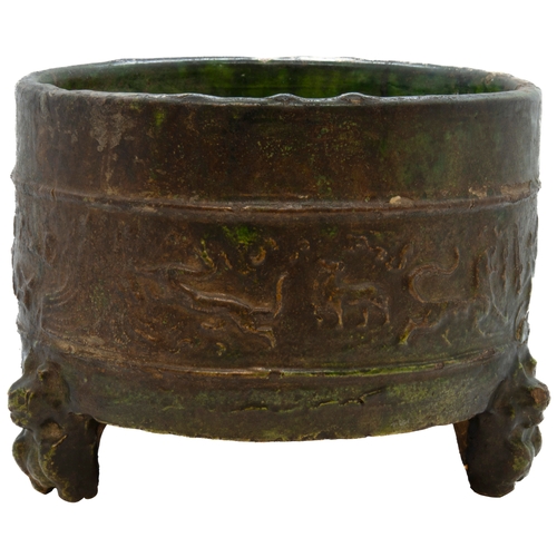 1981 - A CHINESE GREEN-GLAZED ARCHAISTIC TRIPOD CENSERHAN DYNASTY, (206 BC-220 AD)of cylindrical form19cm d... 