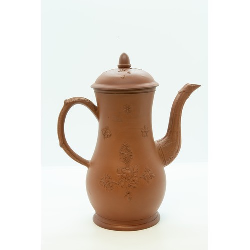 827 - A REDWARE COFFEE POT18TH CENTURYIn the Manner of Eler Brothers, decorated with applied floral sprigs... 