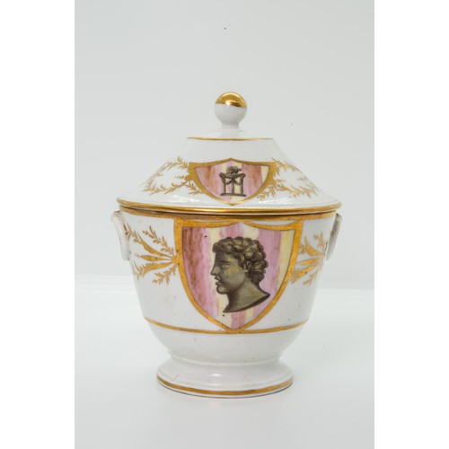 841 - A NEOCLASSICAL SUCRIERCIRCA 1820Decorated with male and female heads within shields, 14cms high.... 