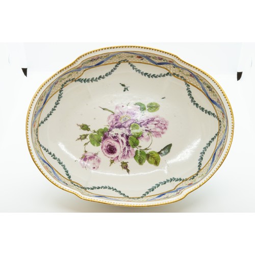 842 - A MEISSEN BASINCIRCA 1765of lobed oval form, painted with floral spray within borders, 27cms wide.... 