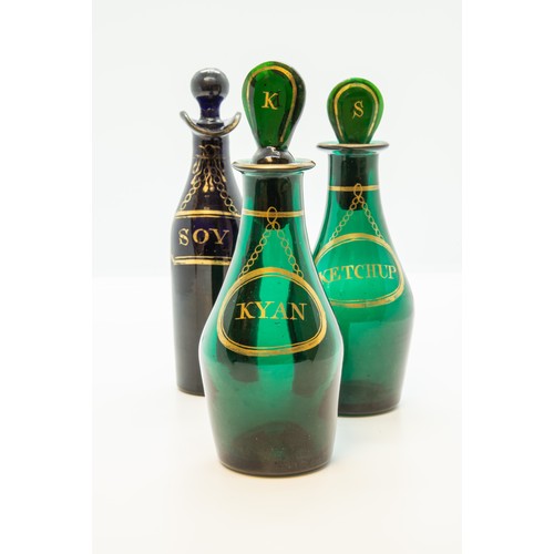 1210 - TWO GREEN GLASS CONDIMENT BOTTLES18TH CENTURYEach with gilded labels, one marked 'KETCHUP', the othe... 