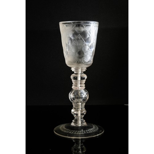 1211 - TWO LARGE EUROPEAN GLASSES18TH CENTURYEngraved to suggest rock crystal, both with early repairs, tal... 