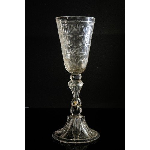 1211 - TWO LARGE EUROPEAN GLASSES18TH CENTURYEngraved to suggest rock crystal, both with early repairs, tal... 