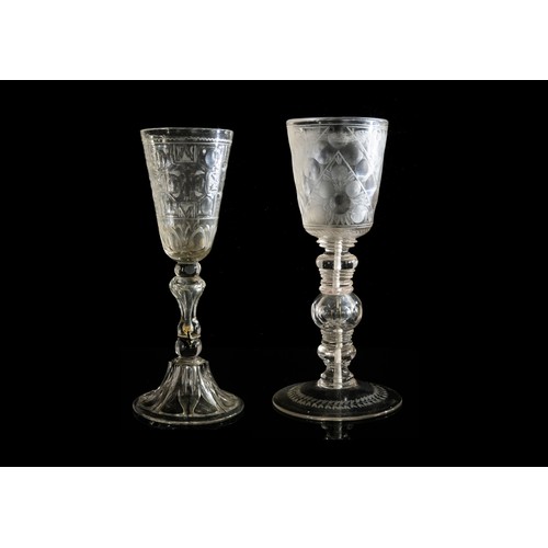 1211 - TWO LARGE EUROPEAN GLASSES18TH CENTURYEngraved to suggest rock crystal, both with early repairs, tal... 