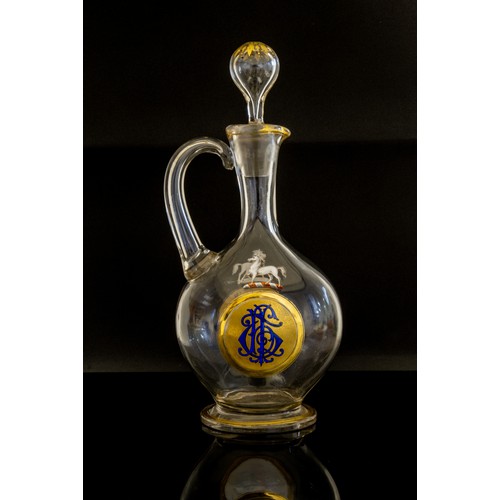 1212 - AN ENAMELLED ARMORIAL CLARET JUGCIRCA 1870Enameled with armorial bearings and monogram to verso, 32c... 