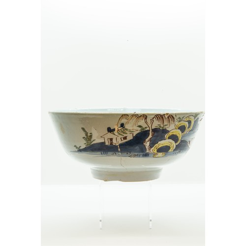 851 - A GROUP OF TIN GLAZED EARTHERN WARES18TH CENTURYComprising a polychrome bowl, pickle tray, porringer... 