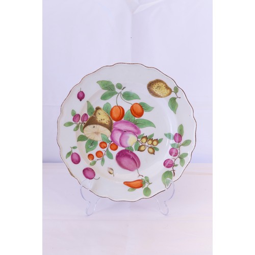 872 - THREE CHELSEA PLATESCIRCA 1760Two similar plates decorated with fruits and another, smaller plate wi... 