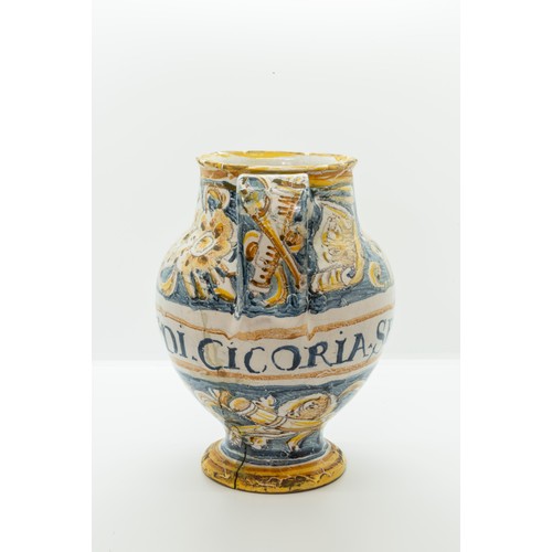 873 - AN ITALIAN FAIENCE SYRUP JARPOSSIBLY 16TH CENTURYInscribed 'Sy DI CICORIA SEMP', 21cms high... 