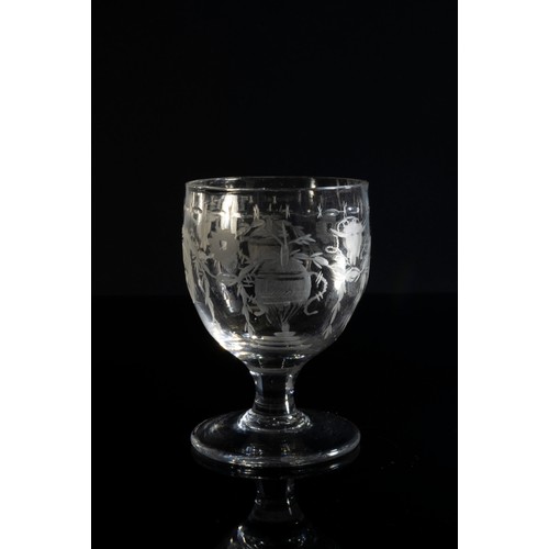 1224 - A NEOCLASSICAL WINE GLASSCIRCA 1780Engraved a continuous band of bulls head and urn motifs, 11cms hi... 