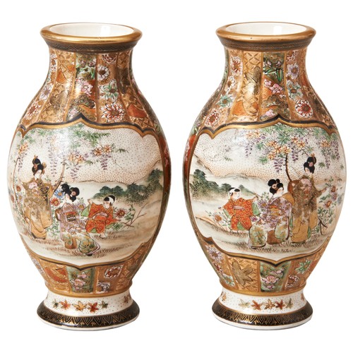 2179 - A PAIR OF JAPANESE SATSUMA VASESMEIJI PERIOD (1868-1912)painted with panels of elegant ladies in ver... 