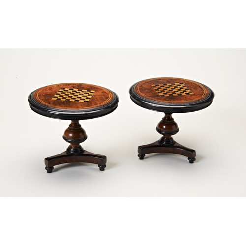 1720 - A PAIR OF MINIATURE VICTORIAN WALNUT 'GAMES' TABLES19TH CENTURYthe circular tilt tops each centred b... 