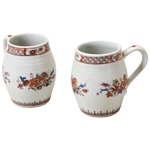 1998 - A PAIR OF CHINESE FAMILLE ROSE BARREL-FORM TANKARDSQIANLONG PERIOD (1736-1795)painted with brightly ... 