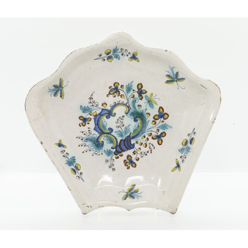904 - A POLYCHROME DELFT PICKLE DISH,18TH CENTURYPainted a floral rococo cartouche, 22cms