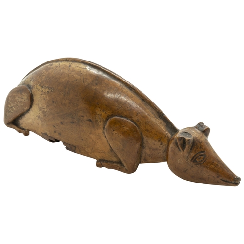 924 - A TREEN WHISTLE NAIEVELY CARVED AS CROUCHING PIG, DATED 1729