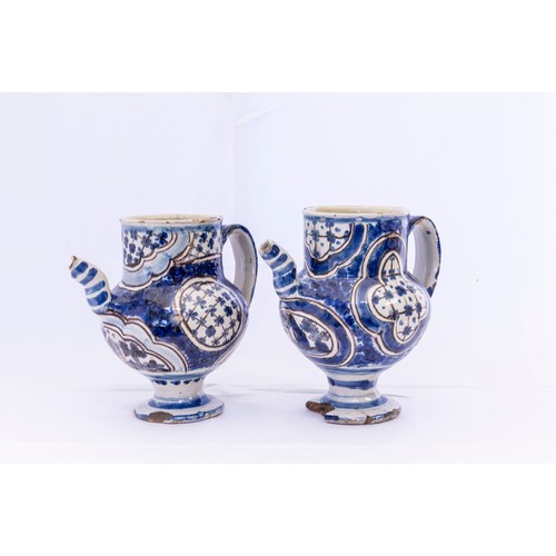 925 - A PAIR OF FAIENCE SYRUP JARS