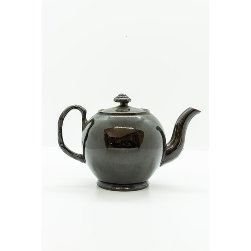 929 - A JACKFEILD WARE TEAPOT