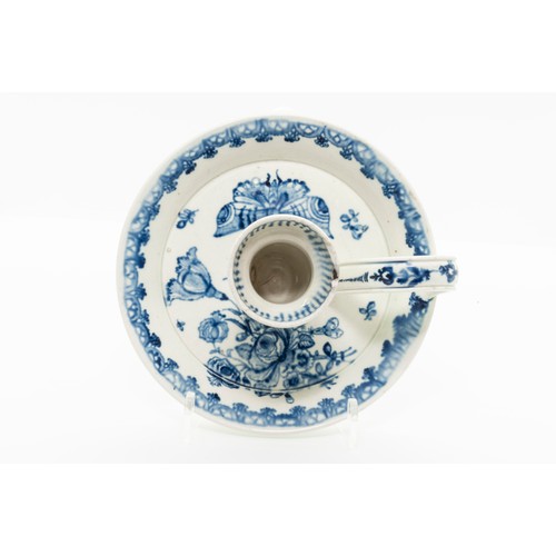 944 - A BLUE AND WHITE CHAMBER STICKLATE 18TH CENTURYPainted with floral sprays and a butterfly, 14cms wid... 