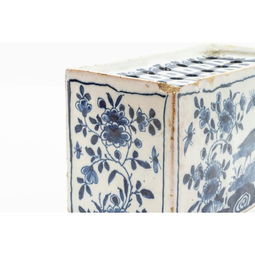 953 - TWO DELFT FLOWER BRICKS18th century, each similarly decorated