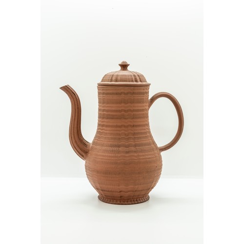 955 - AN ENGINE TURNED REDWARE TEAPOT circa 1750