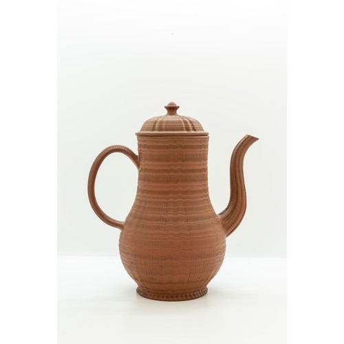 955 - AN ENGINE TURNED REDWARE TEAPOT circa 1750