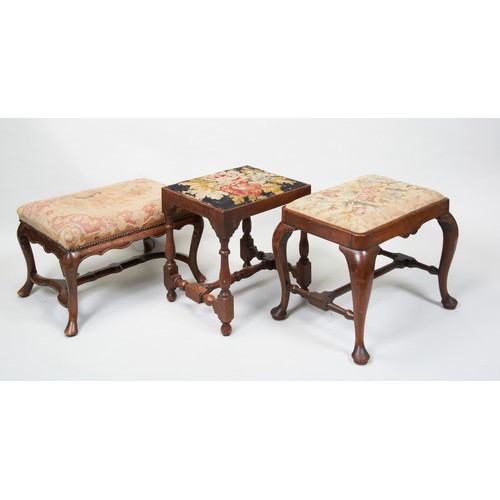 1618 - A CONTINENTAL WALNUT STOOL18TH CENTURYwith a tapestry upholstered stuffed over seat, 60cm wide, 39cm... 