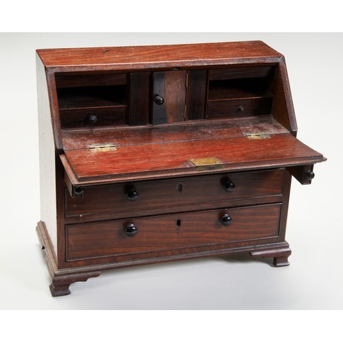 1726 - A MINIATURE GEORGE IV MAHOGANY BUREAUCIRCA 1830in the 18th century style35cm wide, 32cm high, 16cm d... 