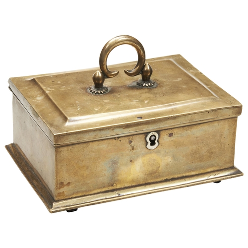 1850 - AN 18TH CENTURY BRASS STRONG BOXthe hinged lid enclosing a compartmented interior23cm wide, 12cm hig... 