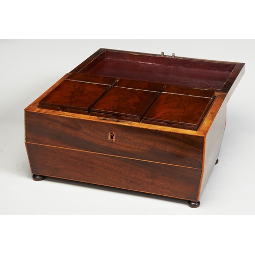 1878 - A REGENCY MAHOGANY AND BOXWOOD TEA CADDYCIRCA 1820of sarcophagus form, fitted with three lidded comp... 