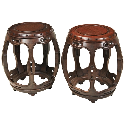 2175 - A PAIR OF CHINESE HARDWOOD DRUM STOOLS20TH CENTURYof typical form30cm diam, 45cm high... 