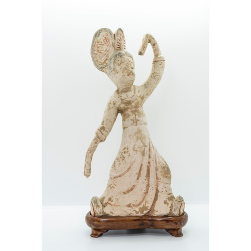 2029 - A CHINESE POTTERY FIGURE OF A SLEEVE DANCERPROBABLY TANG DYNASTY with a fitted hardwood stand29cm hi... 