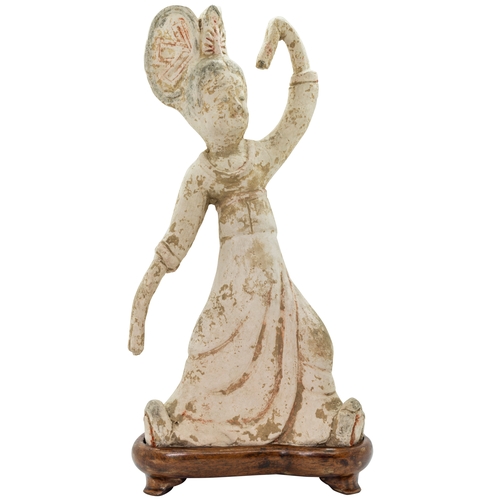 2029 - A CHINESE POTTERY FIGURE OF A SLEEVE DANCERPROBABLY TANG DYNASTY with a fitted hardwood stand29cm hi... 