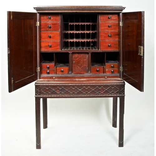 1663 - A FINE GEORGE III SECRETAIRE CABINET ON STANDCIRCA 1760in the manner of Thomas Chippendale, the two ... 