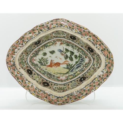 2035 - A CHINESE FAMILLE VERTE TUREEN AND COVERQING DYNASTY, 19TH CENTURYdecorated with mythical beast and ... 