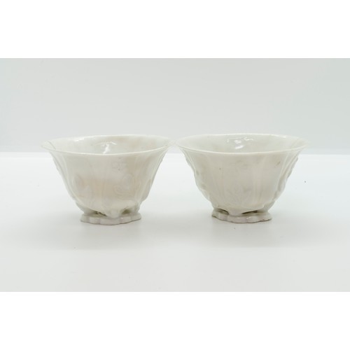 2038 - A PAIR OF CHINESE DEHUA LIBATION CUPSKANGXI PERIODof naturalistic form9cm wide