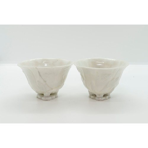 2038 - A PAIR OF CHINESE DEHUA LIBATION CUPSKANGXI PERIODof naturalistic form9cm wide