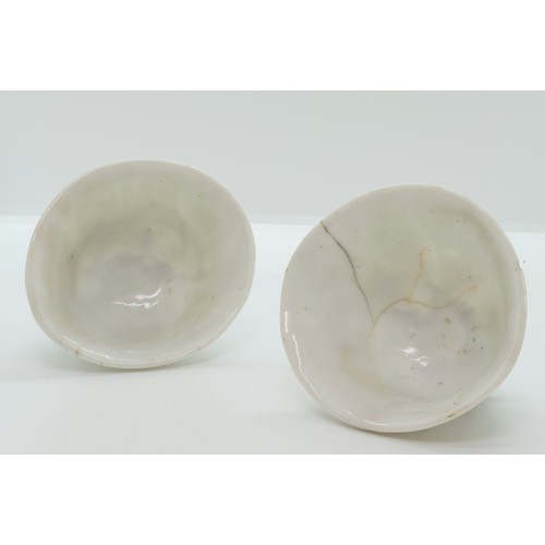 2038 - A PAIR OF CHINESE DEHUA LIBATION CUPSKANGXI PERIODof naturalistic form9cm wide