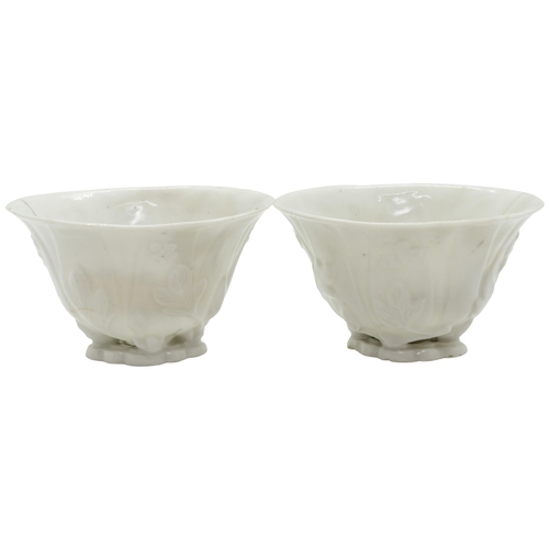 2038 - A PAIR OF CHINESE DEHUA LIBATION CUPSKANGXI PERIODof naturalistic form9cm wide