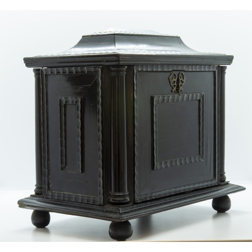 1898 - A FLEMMISH EBONY AND PARQUETRY CASKET18TH CENTURYwith a hinged top and fall front enclosing three fi... 