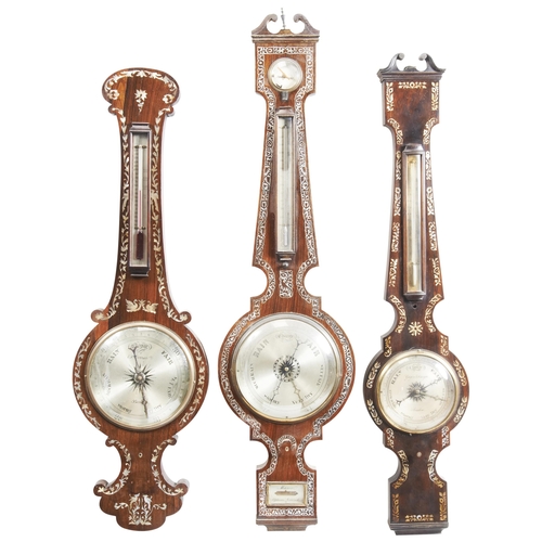 1438 - A GROUP OF THREE VICTORIAN ROSEWOOD AND MOTHER OF PEARL INLAID WHEEL BAROMETERS19TH CENTURYdials sig... 