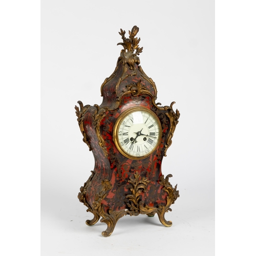 104 - A FRENCH BOULLE MANTLE CLOCK. Striking movement stamped Bartlett, domentable cream enamel dial in a ... 