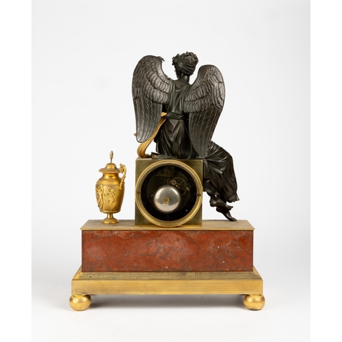 112 - A FRENCH BRONZE AND ORMOLU MANTLE CLOCK. Silk suspension movement, with machined gilt dial and ename... 