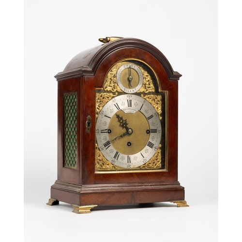 115 - A MAHOGANY CHIMING BRACKET CLOCK. Signed on a silver plaque Guggeon, London, the arch containing chi... 