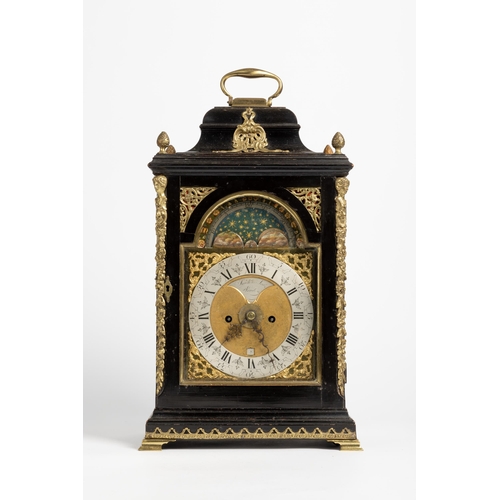 117 - AN EBONY VENEERED STRIKING BRACKET CLOCK. With moon phase and alarm, signed on a recessed plaque in ... 