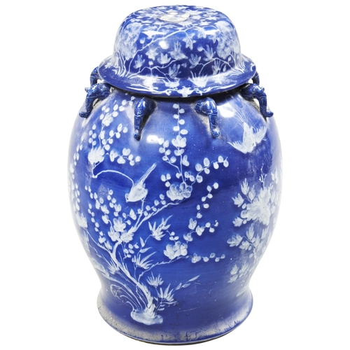 2053 - A LARGE CHINESE BLUE-GROUND WHITE-SLIP DECORATED JAR AND COVERLATE QING / REPUBLIC PERIOD56cm high... 