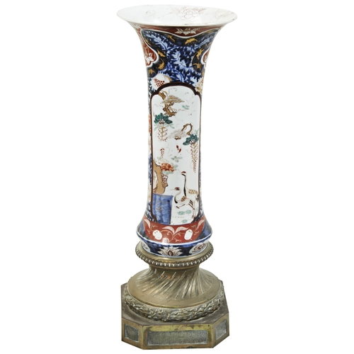 2056 - A LARGE JAPANESE IMARI TRUMPET VASEEDO PERIOD, 18TH / 19TH CENTURYwith a gilt-metal mountvase 51cm h... 