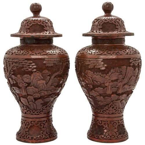 2160 - A PAIR OF CHINESE CINNABAR LACQUER BALUSTER VASES AND COVERSLATE QING DYNASTY25cm high